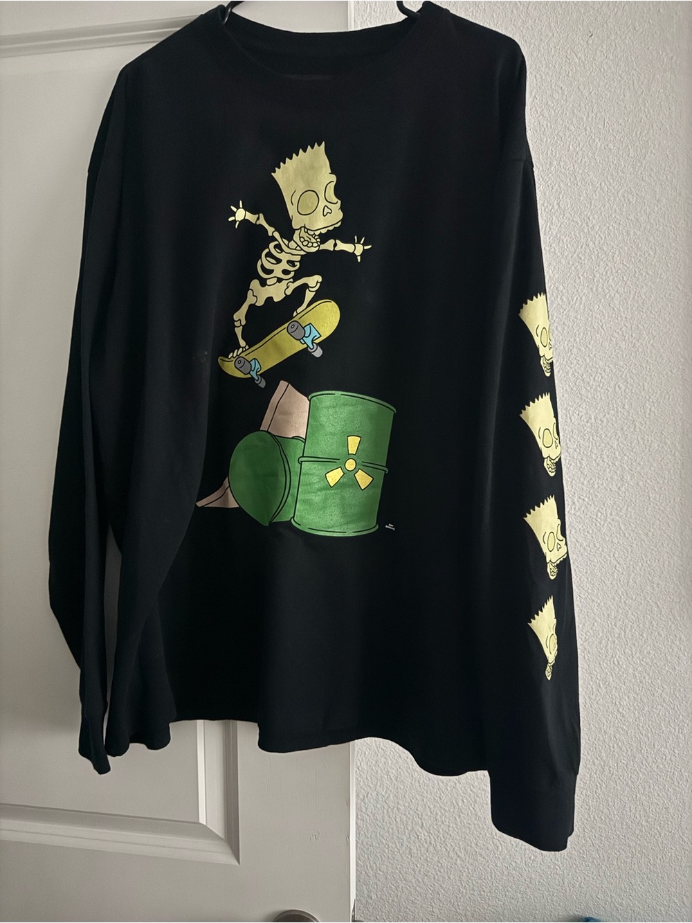 Black Long-Sleeve Graphic Tee with Yellow and Green Skate Art